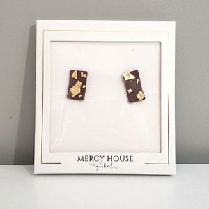 NWT polymer studs with gold leaf